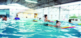 Swim for Life Vietnam teached children like these to swim.  Children in a swimming pool in Vietnam.